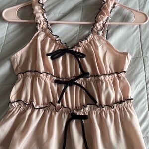 Dusty rose frilly camisole with black bows